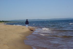 This beach walker on Lake Superior just east of Marquette is probably in the right spot.